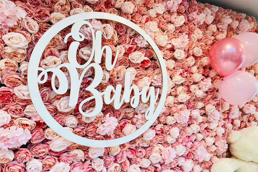 Elegant pink floral wall for baby shower decorations and photo booth