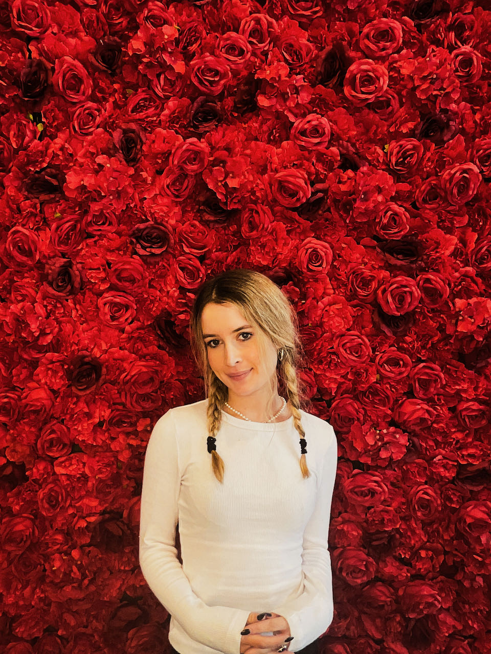 Red floral wall backdrop for events, photo booths, and celebrations across Auckland, New Zealand