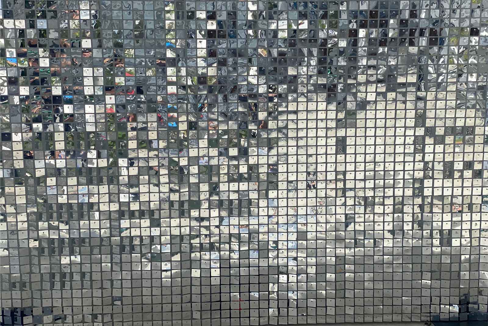 Silver shimmer wall backdrop for corporate branding and professional photo areas