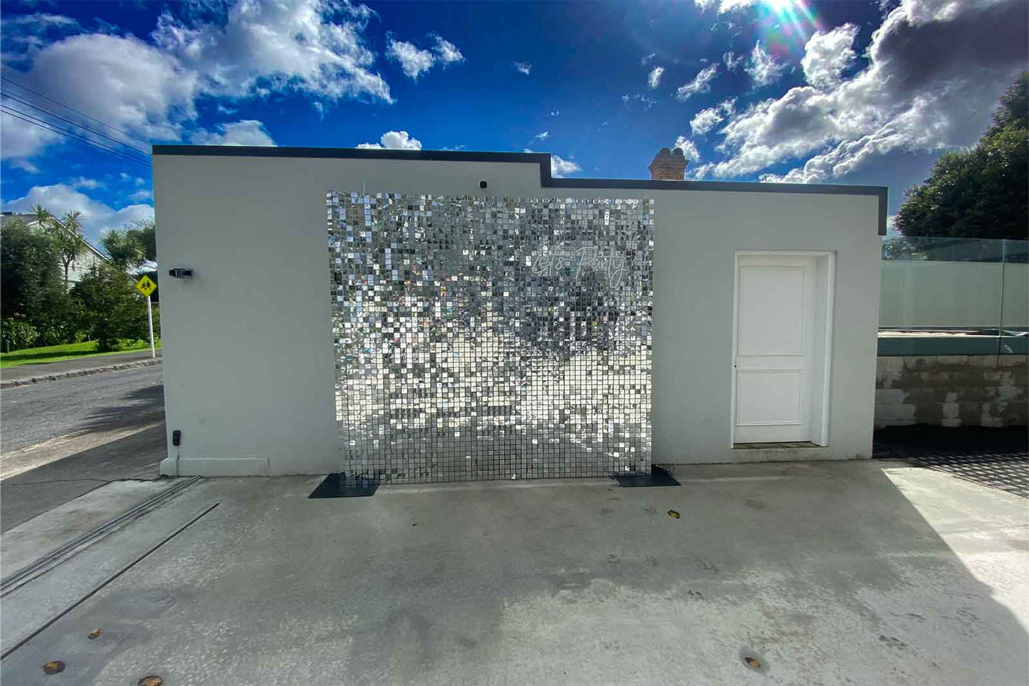 Silver shimmer wall creating stylish photo moments for corporate events