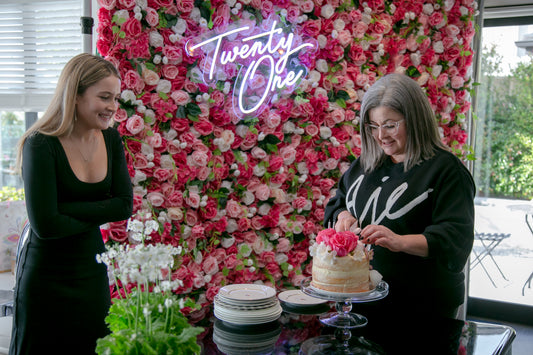 Soft pink and white flower wall backdrop for 21st elegant event décor