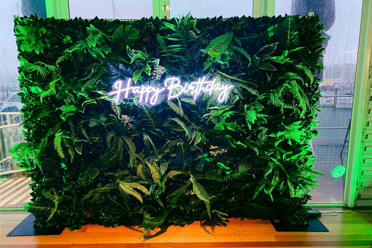 Artificial tropical wall backdrop for stylish event and celebration setup