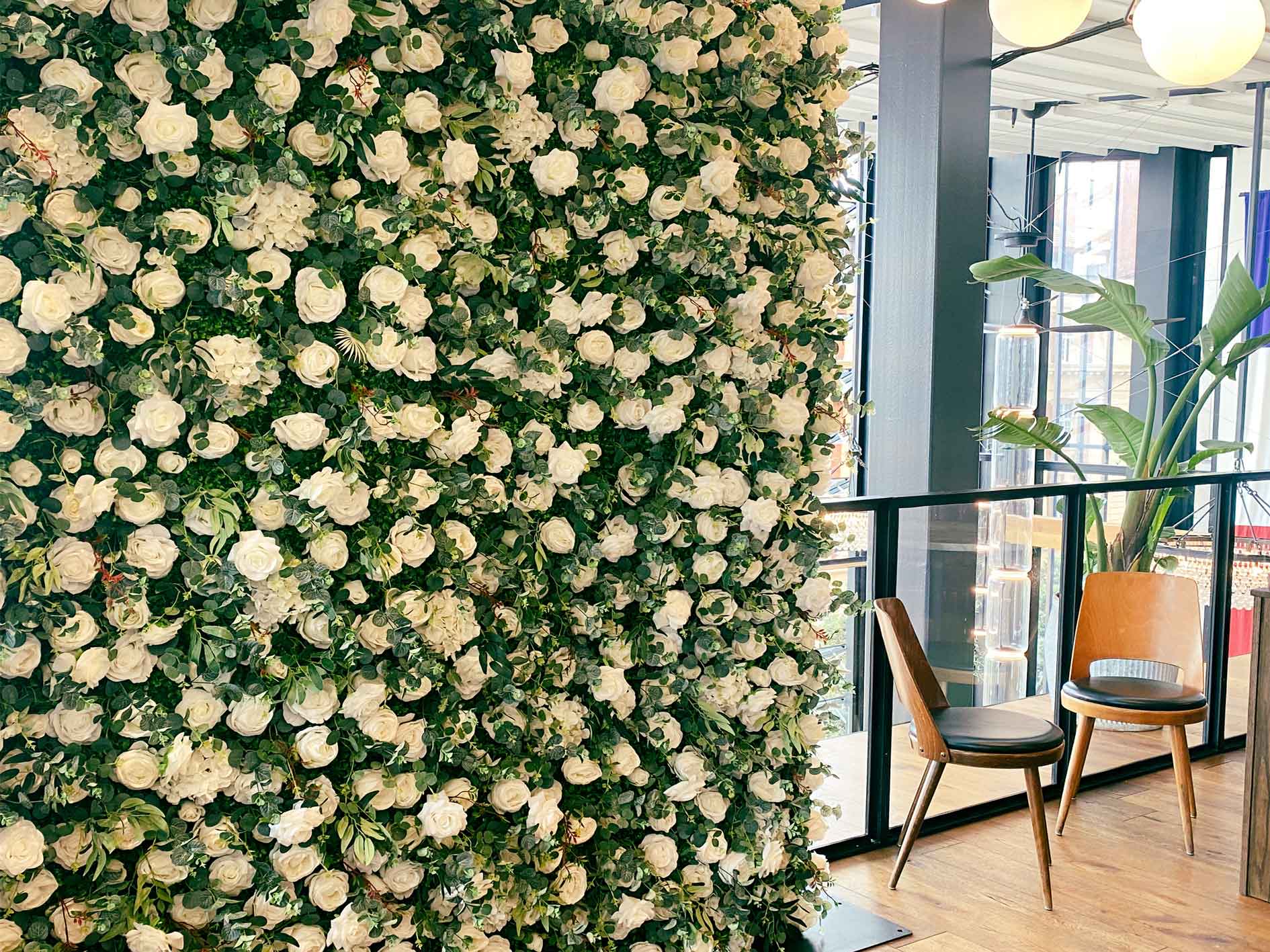 Floral wall backdrop for wedding photo booth