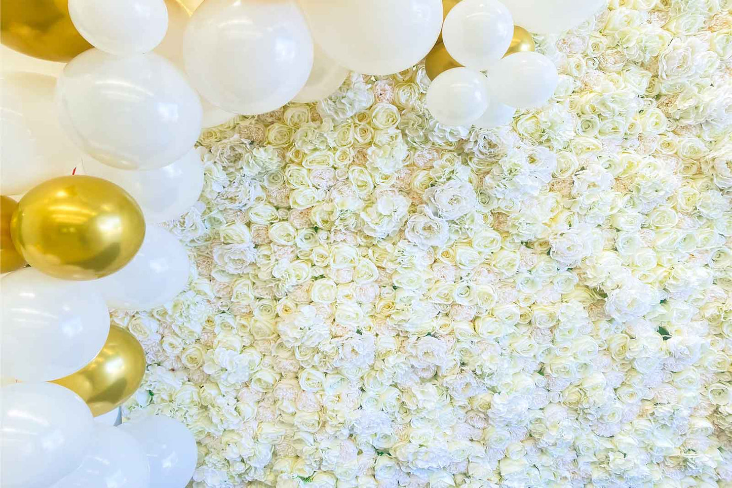 Elegant white flower wall used for baby shower décor and styling